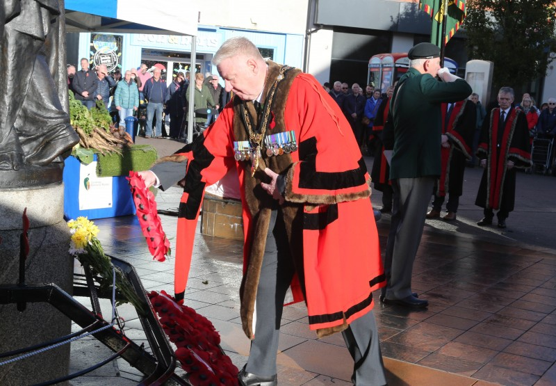 Mayor, Councillor Steven Callaghan lays a wreath at the Armistice Day service at Coleraine War Memorial.
