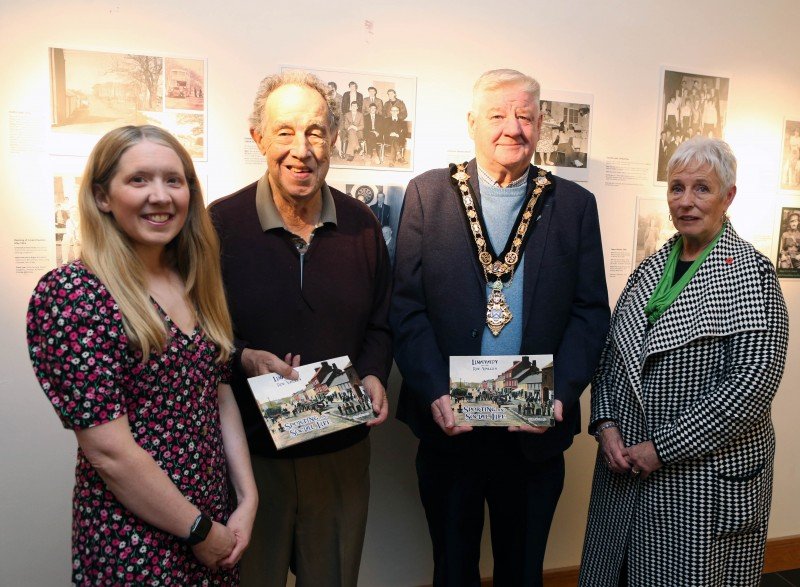 Mayor of Causeway Coast and Glens, Councillor Steven Callaghan alongside Museum Officer Jamie Austin, Nelson McGonagle and Community Engagement Officer, Joanne Honeyford in front of the nostalgic Sporting and Social Life exhibition.