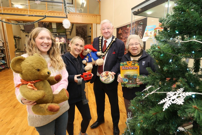 Mayor of Causeway Coast and Glens, Councillor Steven Callaghan alongside Museum Officer Jamie Austin, Lynda Bartlett and Kathleen Walker at the Treasured Toys Exhibition Launch.