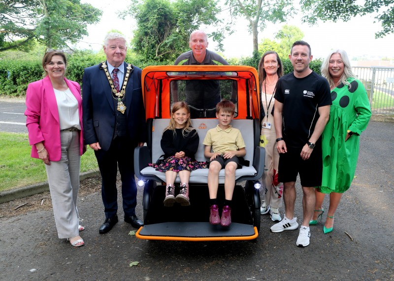 Julienné Elliott, TVM Manager, the Mayor of Causeway Coast and Glens Borough Council Councillor Steven Callaghan, Steven McCartney, Sport & Wellbeing, Rhonda Williamson, Department for Communities, Jonny McFadden, Sport & Wellbeing, Elaine McConaghie, Equality & Diversity Policy Officer and some of the children at the Flowerfield Arts Centre event.