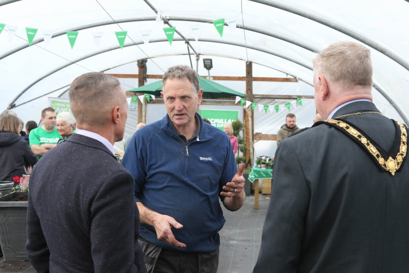 Andrew McClarty chats with the Mayor of Causeway Coast and Glens, Councillor Steven Callaghan and Chief Executive David Jackson at Council’s Macmillan Move More ‘Feel-Good Gardening’ project.