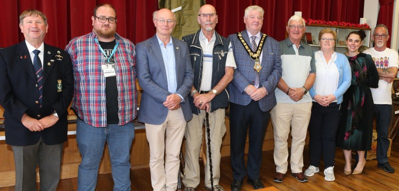 Mayor of Causeway Coast and Glens Borough Council, Councillor Steven Callaghan, pictured alongside committee members and organisers at this year’s Bushmills Through the Wars Exhibition.