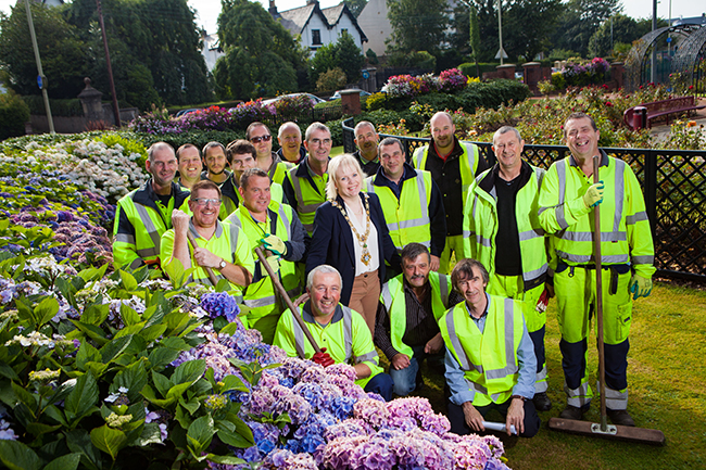 Mayor of Causeway Coast and Glens Borough Council, Councillor Michelle Knight-McQuillan went to meet and thank the teams of Councilâ€™s Street Cleansing and Parks & Cemeteries, to personally congratulate them on achieving First Prize for a Town, in this yearâ€™s Translinkâ€™s Ulster in Bloom competition. Photo taken at Coleraineâ€™s Rose Gardens, open to the public. 