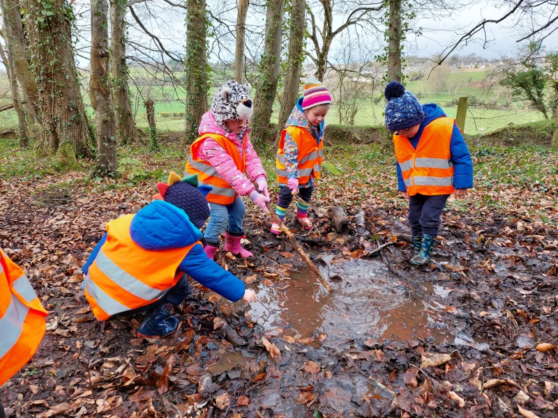 Children explore some muddy puddles in Ballycastle Forest during the Playful Museums Festival ‘Seek, Find, Speak, Create’ project.
