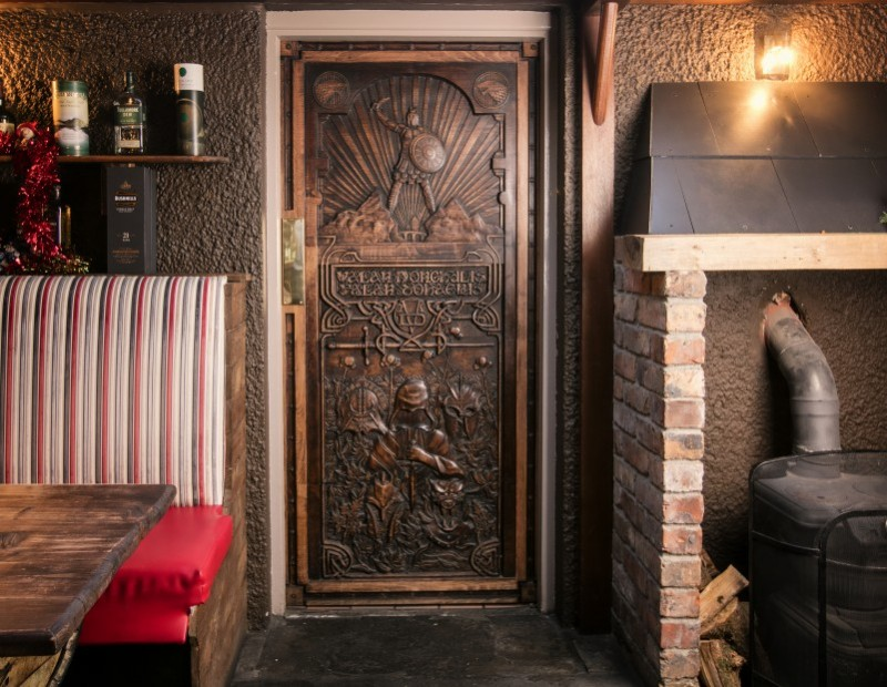 The Game of Thrones© door which can be found in Mary McBride’s bar in Cushendun.