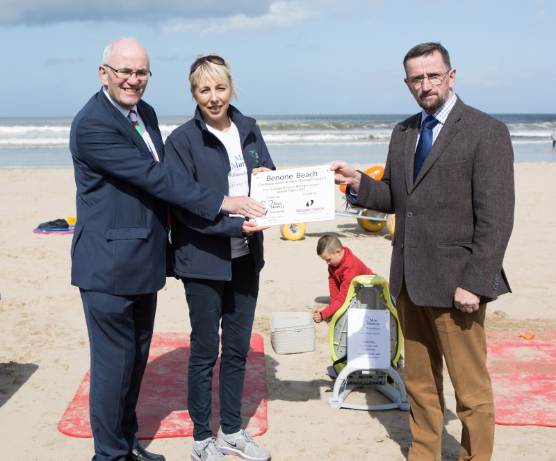 Councillor George Duddy, Chair of Causeway Coast and Glens Leisure and Development Committee is pictured with Peter Wood, Northern Ireland Chair of rugby charity Wooden Spoon and Alix Crawford, Chair of the Mae Murray Foundation at the launch of Northern Ireland's first inclusive beach at Benone.