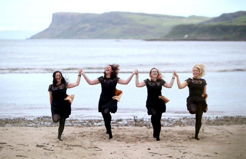 McQuillan dancers Paula Reid, Deirdre Goodlad, Lorna Dallat and Cealach Lavelle practice their steps in the shadow of Fairhead as they prepare for the Ould Lammas Fair which takes place from Saturday 24th August - Tuesday 27th August with four days of entertainment to look forward to.