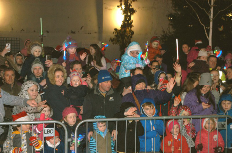 Pictured are the crowds welcoming Santa.
