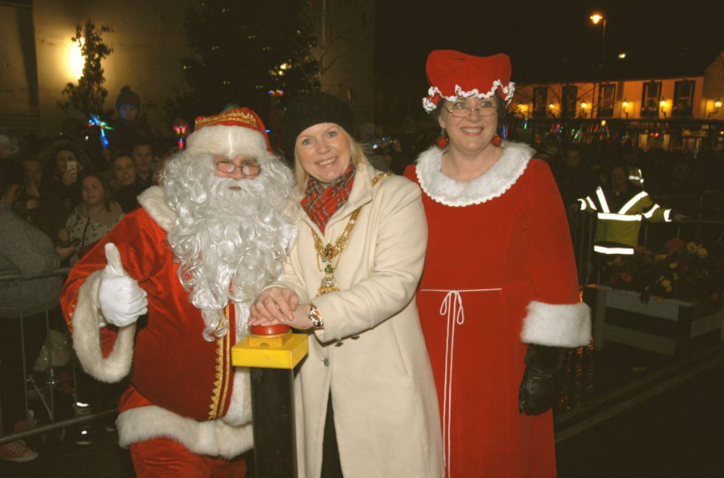 Pictured is Mayor of Causeway Coast and Glens Borough Council, Councillor Michelle Knight-McQuillan with Santa and Mrs Claus switching on the Christmas lights.