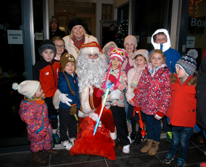Pictured is Mayor of Causeway Coast and Glens Borough Council, Councillor Michelle Knight-McQuillan with Santa meeting children after switching on the lights.