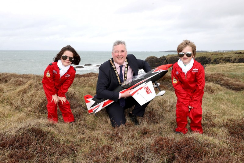 Pictured launching The NI International Air Show 2022 is Mayor of Causeway Coast and Glens, Councillor Richard Holmes and two excited pupils, Leo McIntyre and Evie Cowan from Mill Strand Integrated Primary School in Portrush.