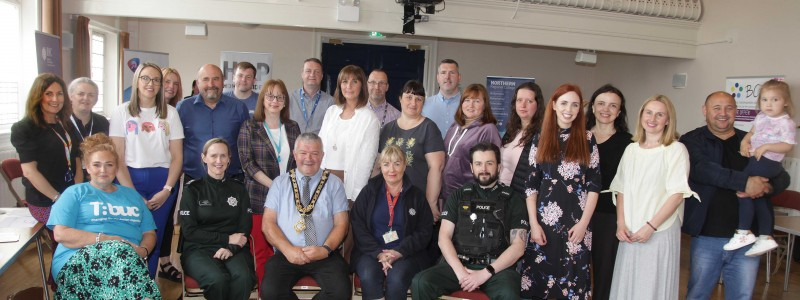 The Mayor of Causeway Coast and Glens Borough Council Councillor Ivor Wallace pictured with attendees and representatives from partner organisations at the information event held in Ballymoney Town Hall.