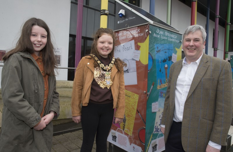 The winners of the John Steinbeck Book Cover Competition pictured with the Mayor of Causeway Coast and Glens Borough Council Councillor Richard Holmes.