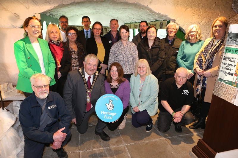 The Mayor of Causeway Coast and Glens, Cllr Ivor Wallace, Cllr Cara McShane, Cllr Margaret-Anne McKillop and council staff, with Stella Byrne from The National Lottery Heritage Fund, and members of the Friends of Ballycastle Museum