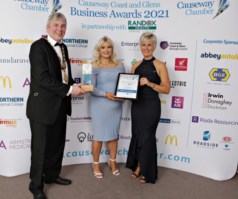 The Mayor of Causeway Coast and Glens Borough Council Councillor Richard Holmes pictured with Jayne Gilmore and Barbara Allison from Stable Lane Boutique, winner of Retailer of the Year.