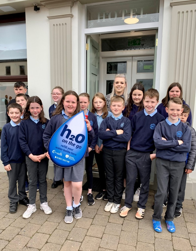 Pupils from Carhill Integrated Primary School pictured outside The Imperial in Garvagh which has signed up to Causeway Coast and Glens Borough Council’s H20 On The Go scheme.