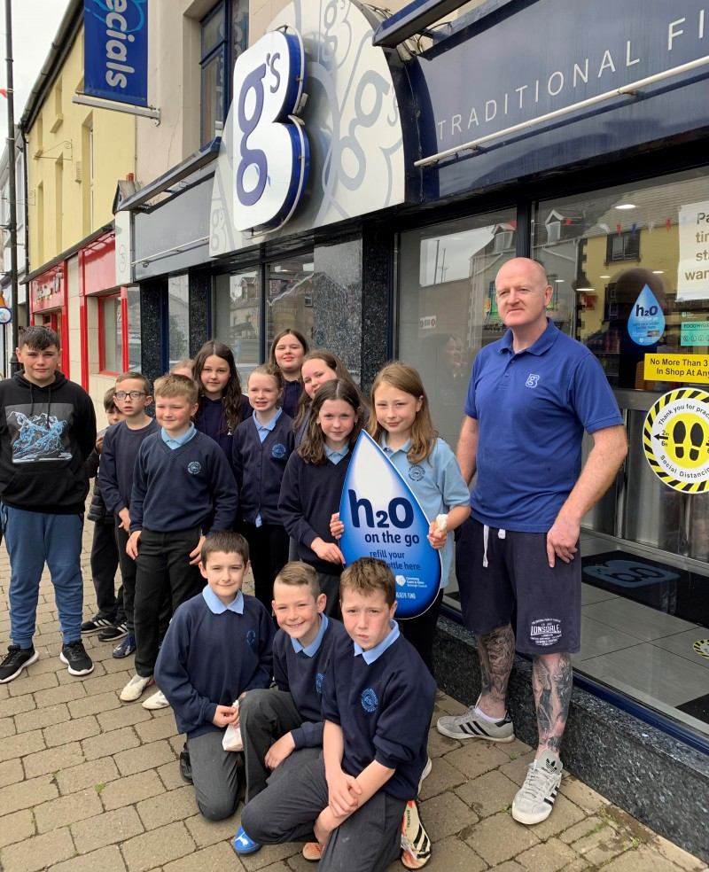 Pupils from Carhill Integrated Primary School pictured at BG’s takeaway in Garvagh which has signed up to Causeway Coast and Glens Borough Council’s H20 On The Go scheme.