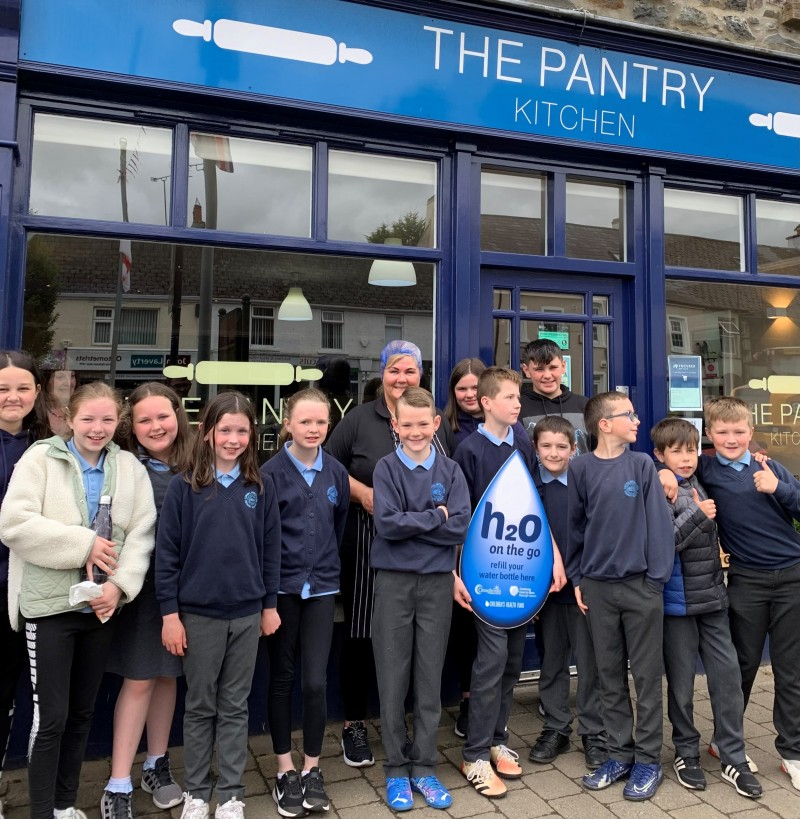 Pupils from Carhill Integrated Primary School pictured at The Pantry in Garvagh which has signed up to Causeway Coast and Glens Borough Council’s H20 On The Go scheme.