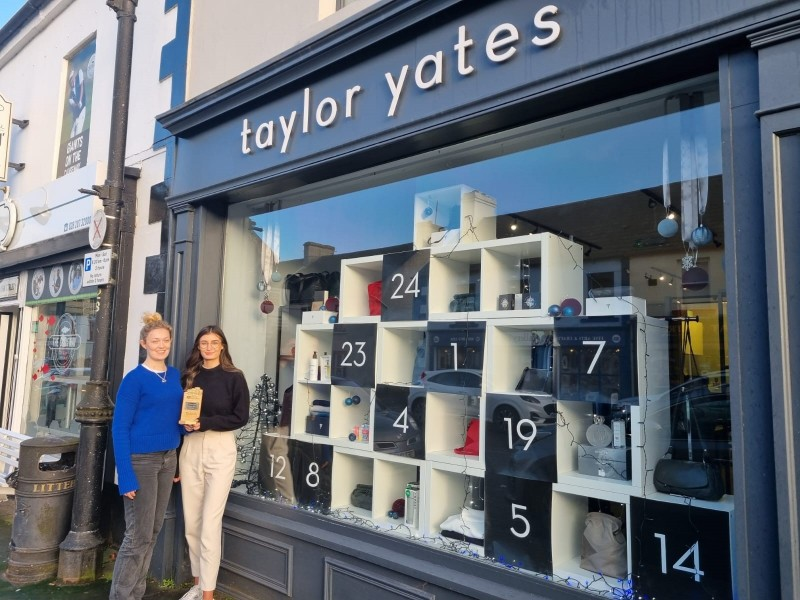 The judges awarded Taylor Yates best window for Bushmills and were particularly impressed that their advent calendar offered shoppers something special every day during December. Pictured with the trophy are Ellen Yates and Aine Donnelly.