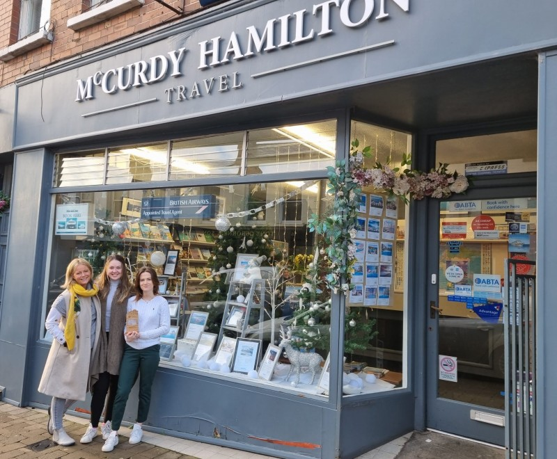 Tara Purcell, Tory Kennedy and Deborah Aiken of McCurdy Hamilton Travel in Ballymoney brought their winter wonderland to Ballymoney town centre and were delighted to win the Christmas Window competition for Ballymoney in 2022.