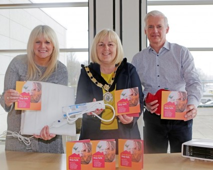 Deputy Mayor Councillor Margaret Ann McKillop joins Council staff Sharon McAfee Head of Health and Built Environment and Nicky Matthews Building Control Manager to promote the Stay Warm Stay Safe Campaign.