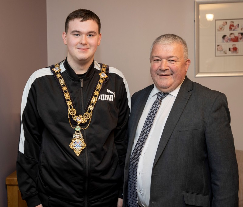 The Mayor of Causeway Coast and Glens Borough Council, Councillor Ivor Wallace pictured with club member Nathan Lyons who also competed at the November Swim Gala but was unable to attend the Cloonavin reception.