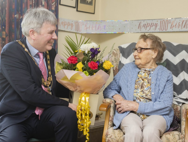 The Mayor of Causeway Coast and Glens Borough Council Councillor Richard Holmes makes a special presentation to Tillie Virtue who celebrates her 100th birthday on February 11th 2022.