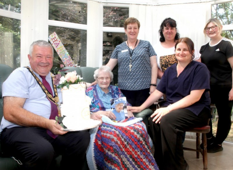 The Mayor of Causeway Coast and Glens Borough Council Councillor Ivor Wallace pictured with Ida Love who celebrated her 100th birthday recently along with her great-niece Sharon Maxwell and staff at The Cara Residential Home in Rasharkin, Linda Jamieson (Manager), Natalie Dunlop (Senior-in-charge Officer) and Aleisha McErlean (Care Assistant).