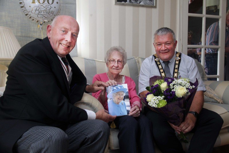 Jean Jackson who celebrated her 100th birthday recently pictured with Peter Sheridan, Deputy Lieutenant of County Londonderry, and the Mayor of Causeway Coast and Glens Borough Council Councillor Ivor Wallace.
