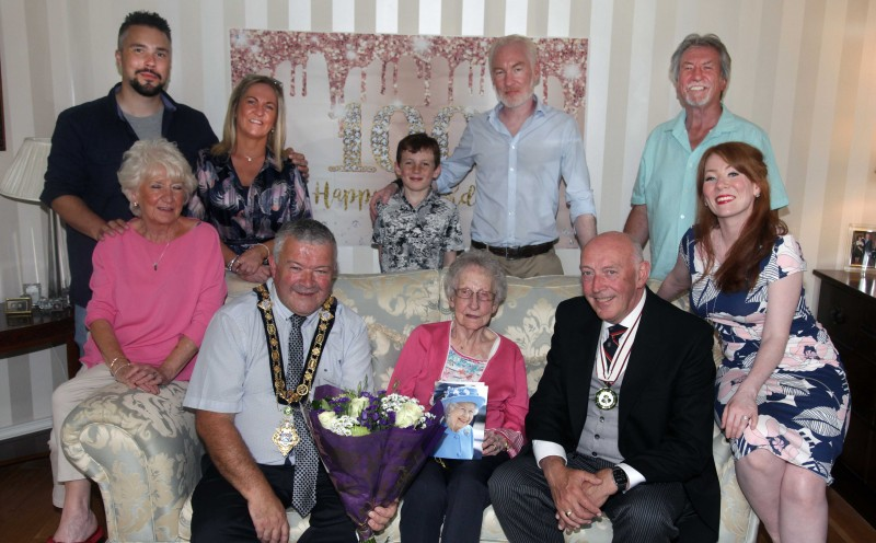 Jean Jackson who celebrated her 100th birthday recently pictured with Peter Sheridan, Deputy Lieutenant of County Londonderry, the Mayor of Causeway Coast and Glens Borough Council Councillor Ivor Wallace and family members.