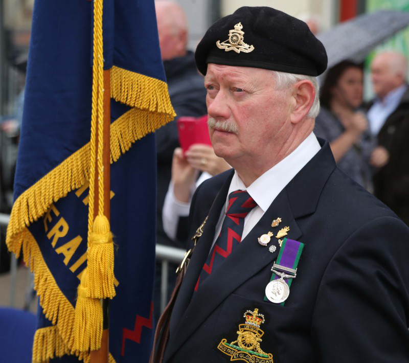 Standard bearer James Taggart pictured during the parade on Saturday.