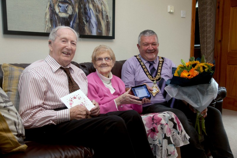 Alex and Agnes McElreavey who celebrated their 70th wedding anniversary on September 10th 2022 pictured with the Mayor of Causeway Coast and Glens Borough Council, Councillor Ivor Wallace.