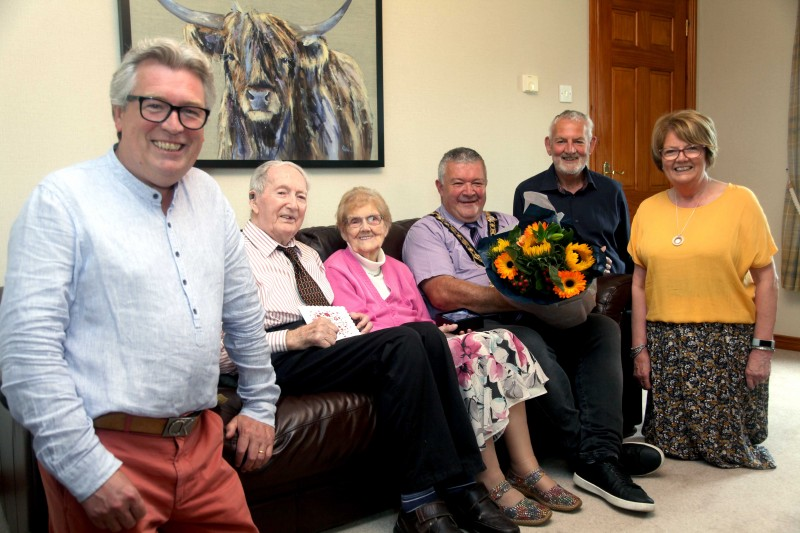 Alex and Agnes McElreavey who celebrated their 70th wedding anniversary on September 10th 2022 pictured with the Mayor of Causeway Coast and Glens Borough Council, Councillor Ivor Wallace, and their three children, Valerie, John and Kenneth.