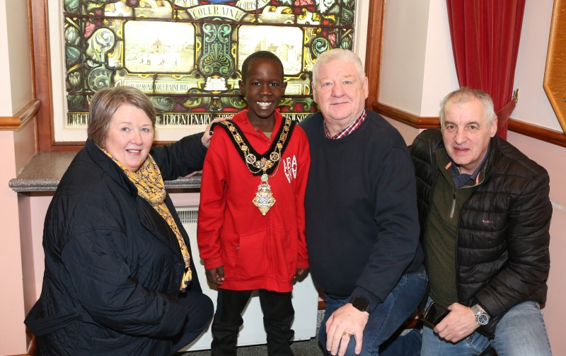 Mayor of Causeway Coast and Glens, Councillor Steven Callaghan and the Mayoress pictured with Maurice Bradley and one of the children from Abanna New Life Choir.