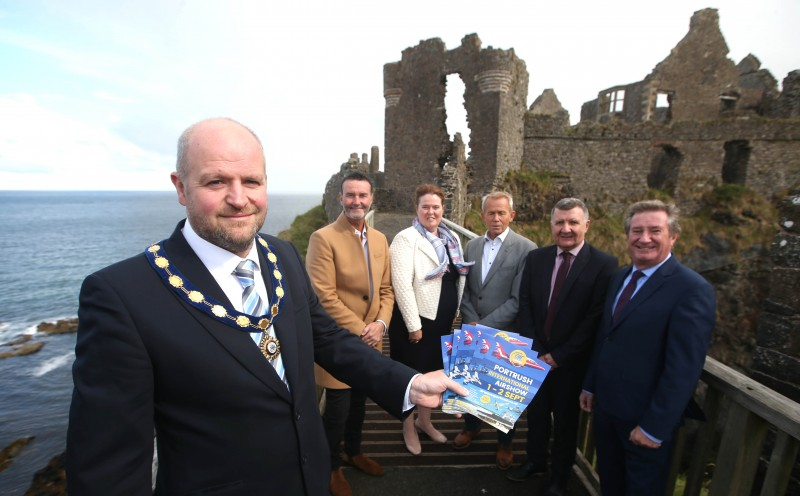 The Deputy Mayor of Causeway Coast and Glens Borough Council Councillor Trevor Clarke is joined at Dunluce Castle by (left to right) Damian Morelli (Morellis), Natasha Garrott, (Portrush Atlantic Hotel), Brendan McIntyre (B & E Security Systems), Sam Todd (Translink NI) and Bill Montgomery (Invest NI) as the countdown to Air Waves Portrush continues. The event returns to the resort on September 1st and 2nd.