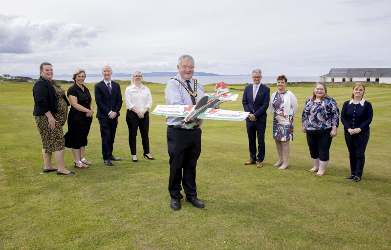 The Mayor of Causeway Coast and Glens Borough Council Councillor Ivor Wallace prepares for the return of the NI International Air Show on September 10th and 11th along with Natasha Garrott (Portrush Atlantic), Gillian Gregg (Pulsar), Sir Michael J Ryan CBE from Spirit AeroSystems, new joint title sponsor, Alana Colenso from joint title sponsor Thales, Kevin McNamee from Denroy Plastics Ltd, Grainne McVeigh from Invest NI, Catherine Deery and Noeleen McKillop from The Honourable The Irish Society.