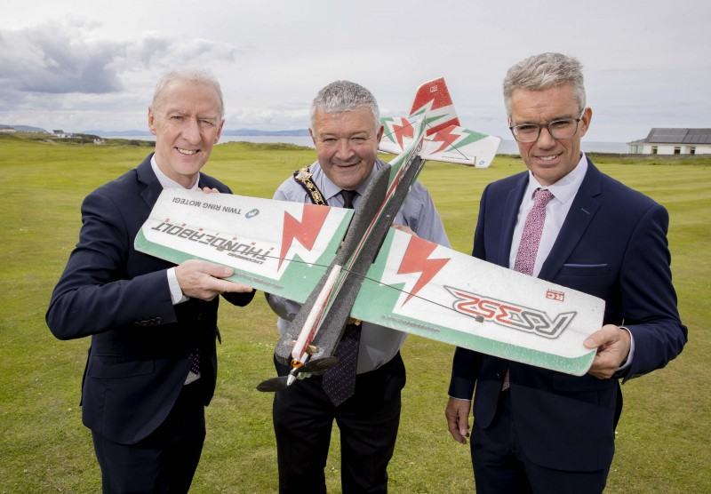 The Mayor of Causeway Coast and Glens Borough Council Councillor Ivor Wallace pictured in Portrush with Sir Michael J Ryan CBE from Spirit AeroSystems, new joint title sponsor of the NI International Air Show, and Kevin McNamee, CEO of Denroy Plastics Ltd, sponsors of the event’s Business Engagement Day.