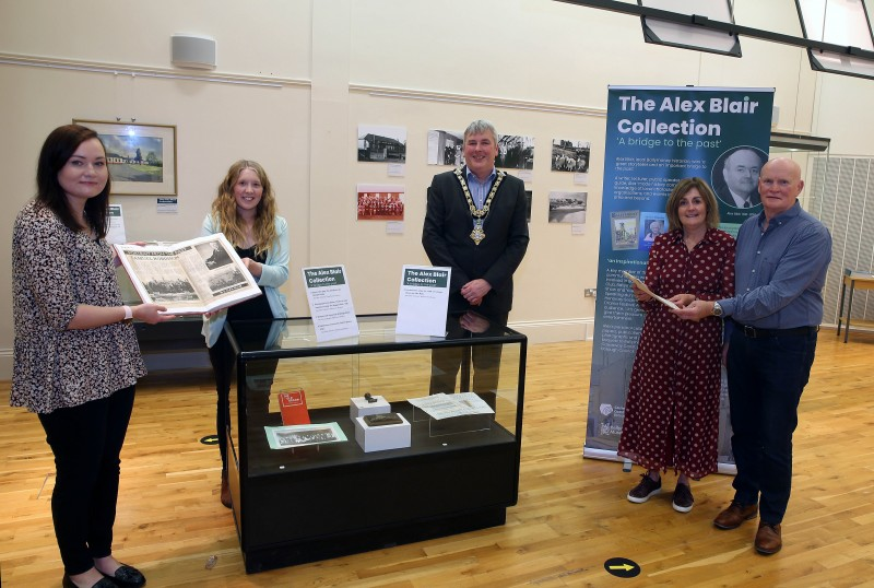 The Mayor of Causeway Coast and Glens Borough Council, Councillor Richard Holmes pictured at the Ballymoney Museum exhibition showcasing the personal collection of Alex Blair (1941-2018) with Museum Assistant Rachel Archibald, Museum Officer Jamie Austin, and representatives of Alex's family, Elaine Lee and William Lee.