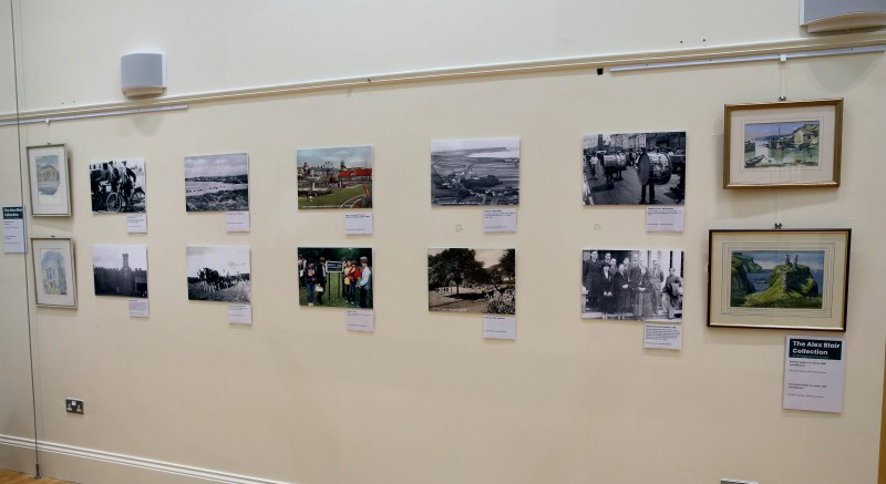 Some of the items which are now on display in Ballymoney Museum as part of the new Alex Blair collection exhibition including photographs of people and places from the Causeway Coast and Glens and paintings by the late Jack Wilkinson.