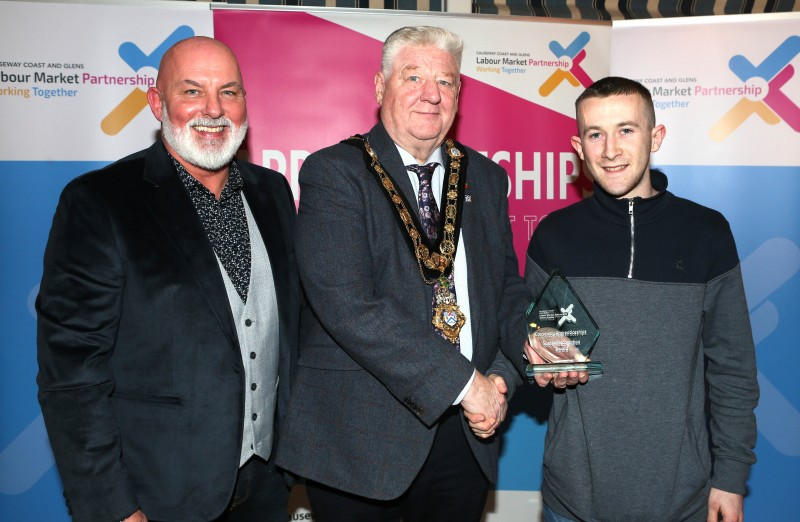 Mayor of Causeway Coast and Glens, Councillor Steven Callaghan alongside Labour Market Partnership Manager, Marc McGerty presenting Aaron McLaughlin with a Special Recognition Award.