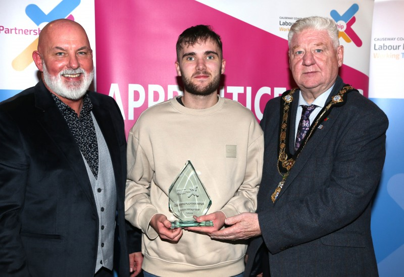 Mayor of Causeway Coast and Glens, Councillor Steven Callaghan alongside Labour Market Partnership Manager, Marc McGerty presenting Jack Campbell with a Special Recognition Award.