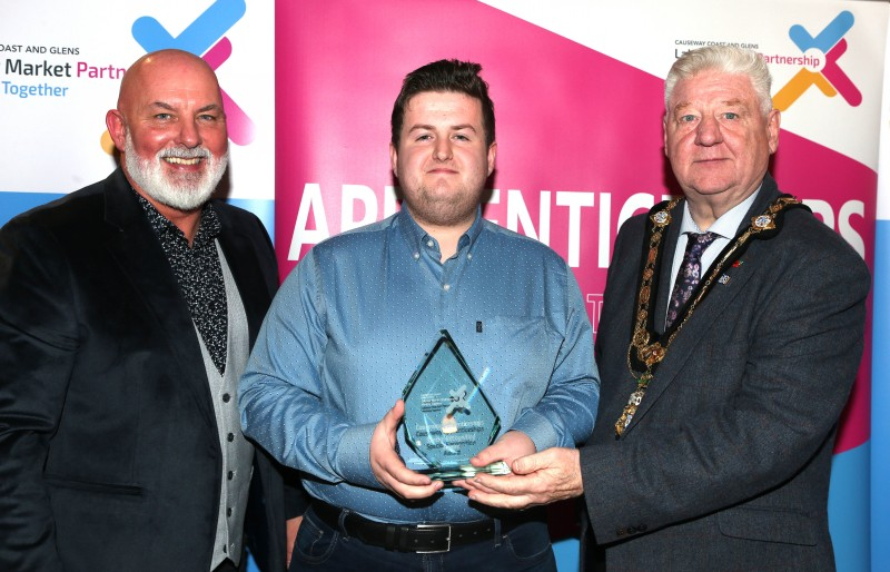 Mayor of Causeway Coast and Glens, Councillor Steven Callaghan alongside Labour Market Partnership Manager, Marc McGerty presenting Jack Edgar with a Special Recognition Award.