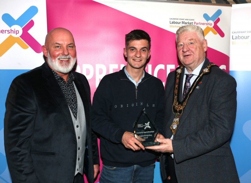 Mayor of Causeway Coast and Glens, Councillor Steven Callaghan alongside Labour Market Partnership Manager, Marc McGerty presenting Matthew Nicholl with a Special Recognition Award.