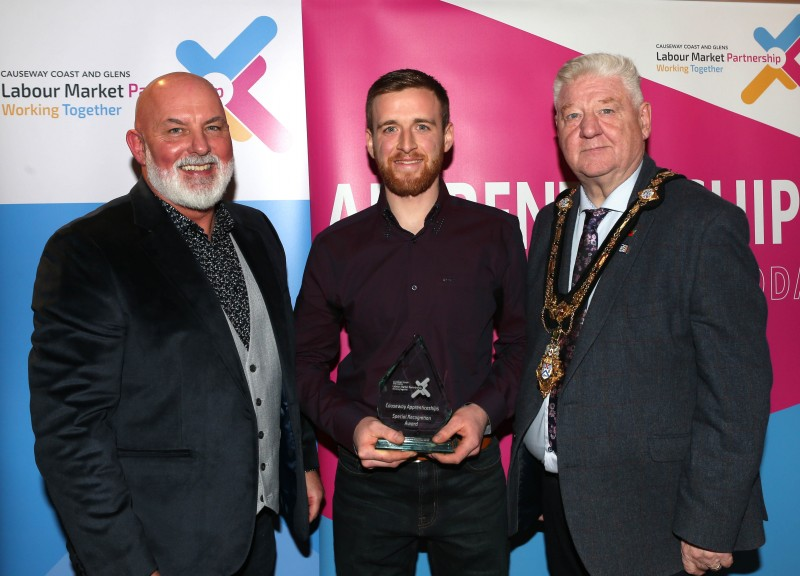 Mayor of Causeway Coast and Glens, Councillor Steven Callaghan alongside Labour Market Partnership Manager, Marc McGerty presenting Samuel Gilmore with a Special Recognition Award.