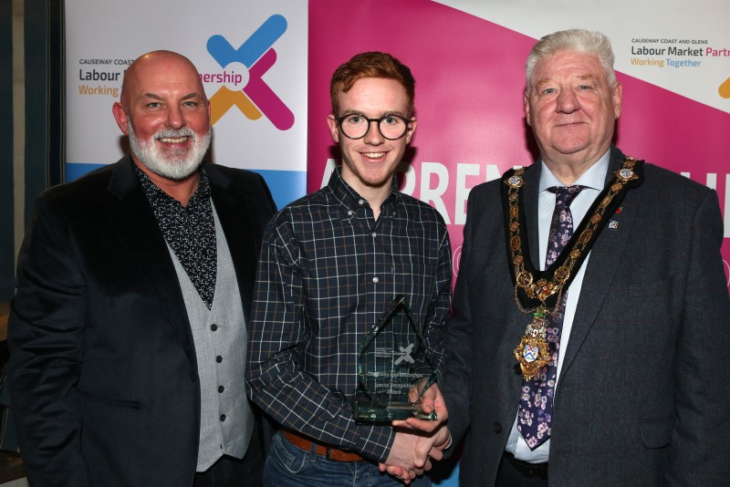 Mayor of Causeway Coast and Glens, Councillor Steven Callaghan alongside Labour Market Partnership Manager, Marc McGerty presenting Timothy Gilmore with a Special Recognition Award.