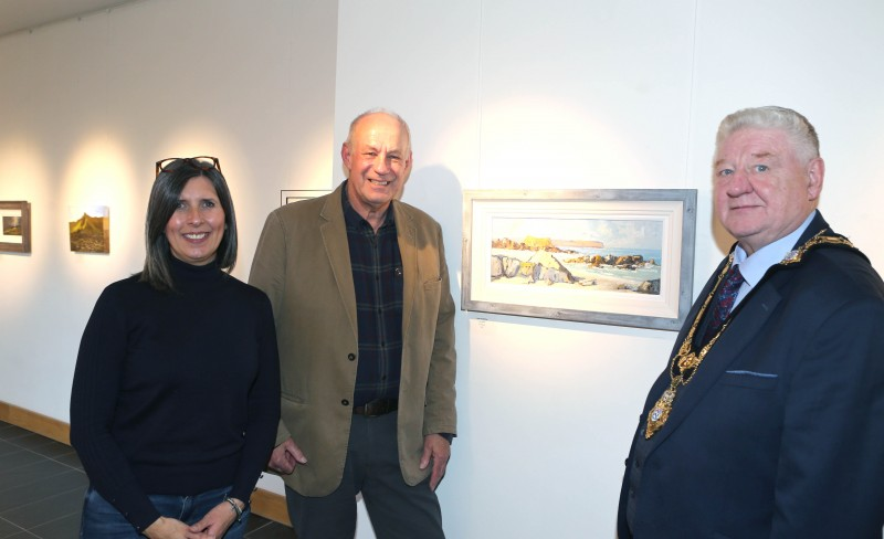 Pictured at the opening of Limavady Art Group’s Winter Exhibition; Mayor of Causeway Coast and Glens, Councillor Steven Callaghan alongside Council staff member Sharon Colhoun and artist Jim Holmes.