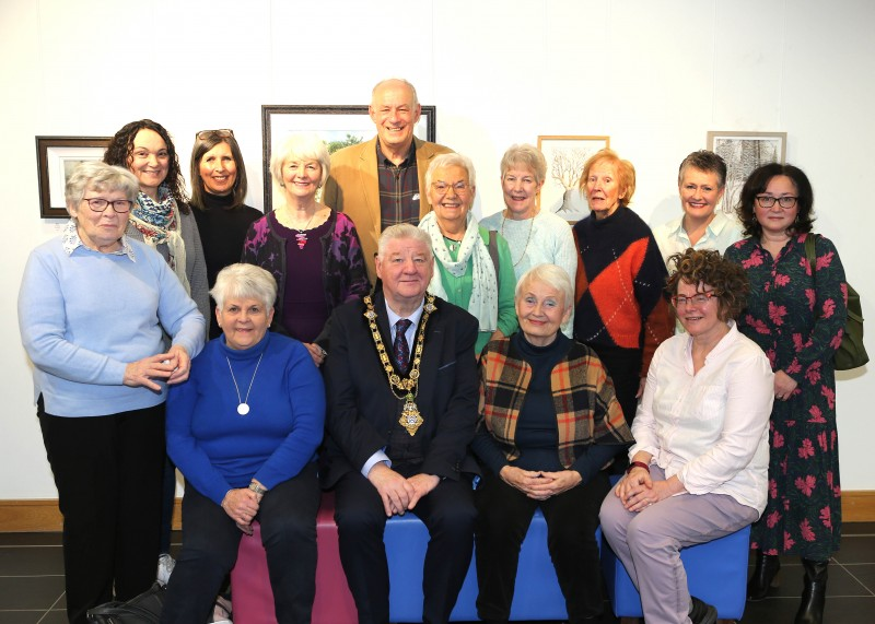 The Mayor of Causeway Coast and Glens, Councillor Steven Callaghan pictured alongside members of Limavady Art Group and friends who attended the opening of their Winter Exhibition in Roe Valley Arts and Cultural Centre.