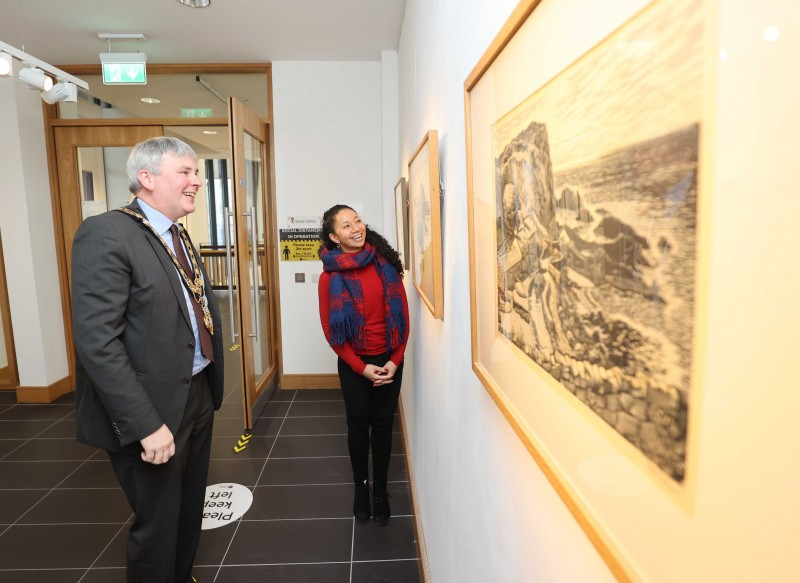 The Mayor of Causeway Coast and Glens Borough Council Councillor Richard Holmes pictured with Arts and Culture Facilities Officer Esther Alleyne during a visit to the Causeway Collection 100 exhibition which is open during December at Roe Valley Arts and Cultural Centre as part of Council’s NI 100 programme.