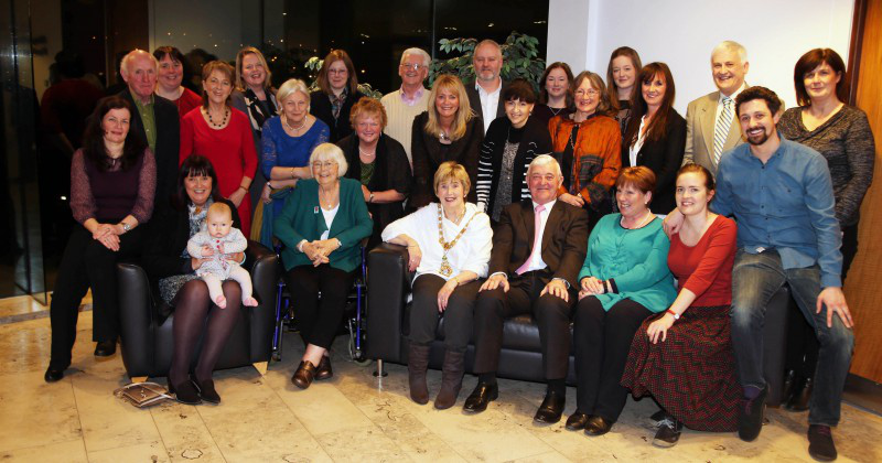 Carol Hutton pictured with all of those who attended a very special reception held in her honour in Cloonavin, to recognise and acknowledge her contribution to the arts sector, and her work with Causeway Coast Artists.