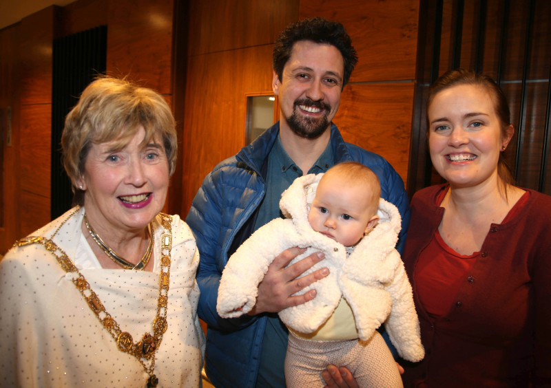 The youngest guest at the reception was little Frances Frew – she is pictured here with her parents Catherine Frew and Adam Frew, along with the Mayor of Causeway Coast and Glens Borough Council, Alderman Maura Hickey.